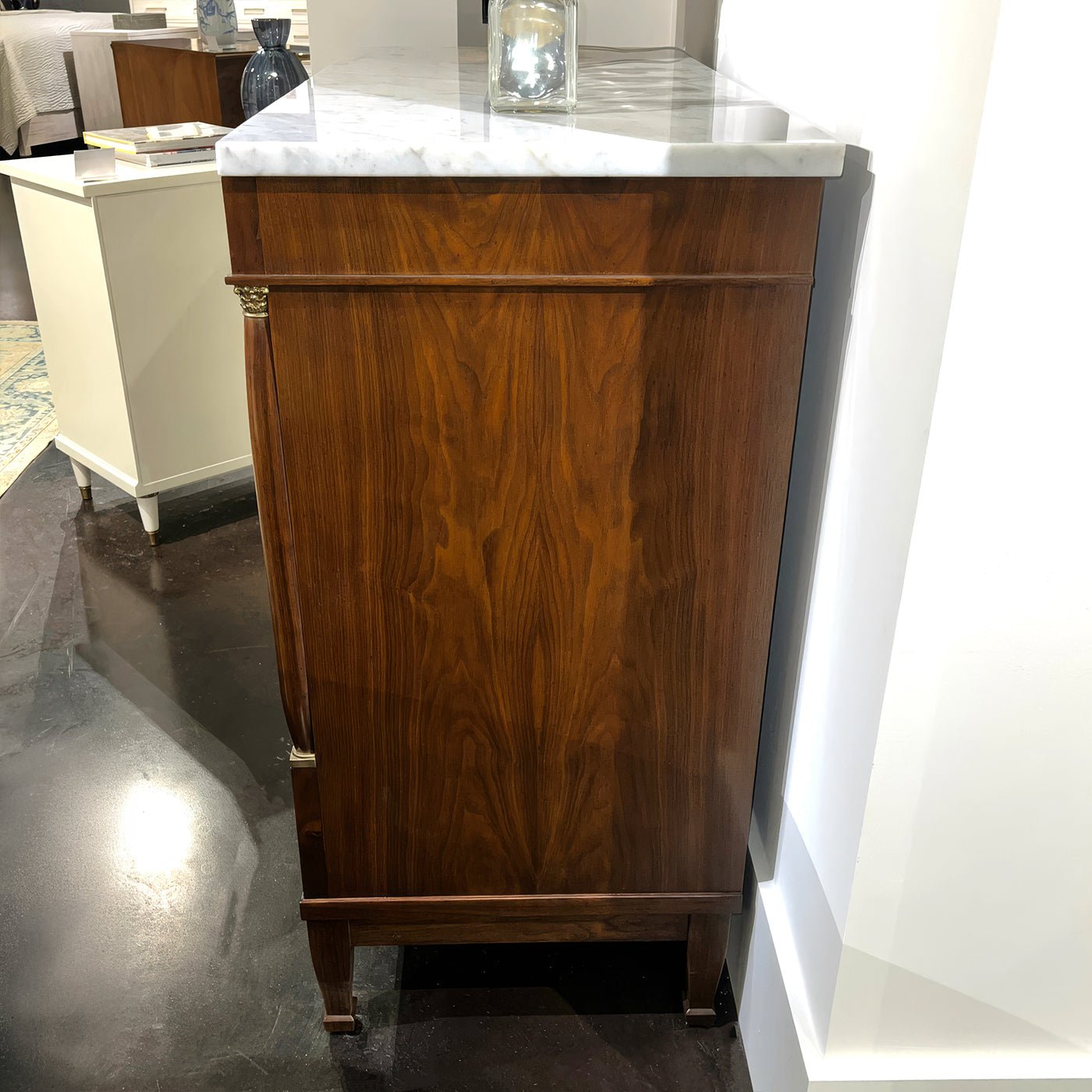 Side view of Tall Empire chest, showing wood grain.