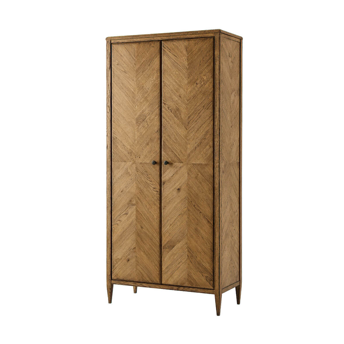 Tall light oak cabinet three-quarter view with doors closed.