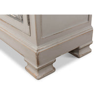 Cabinet base close-up, showing feet design.