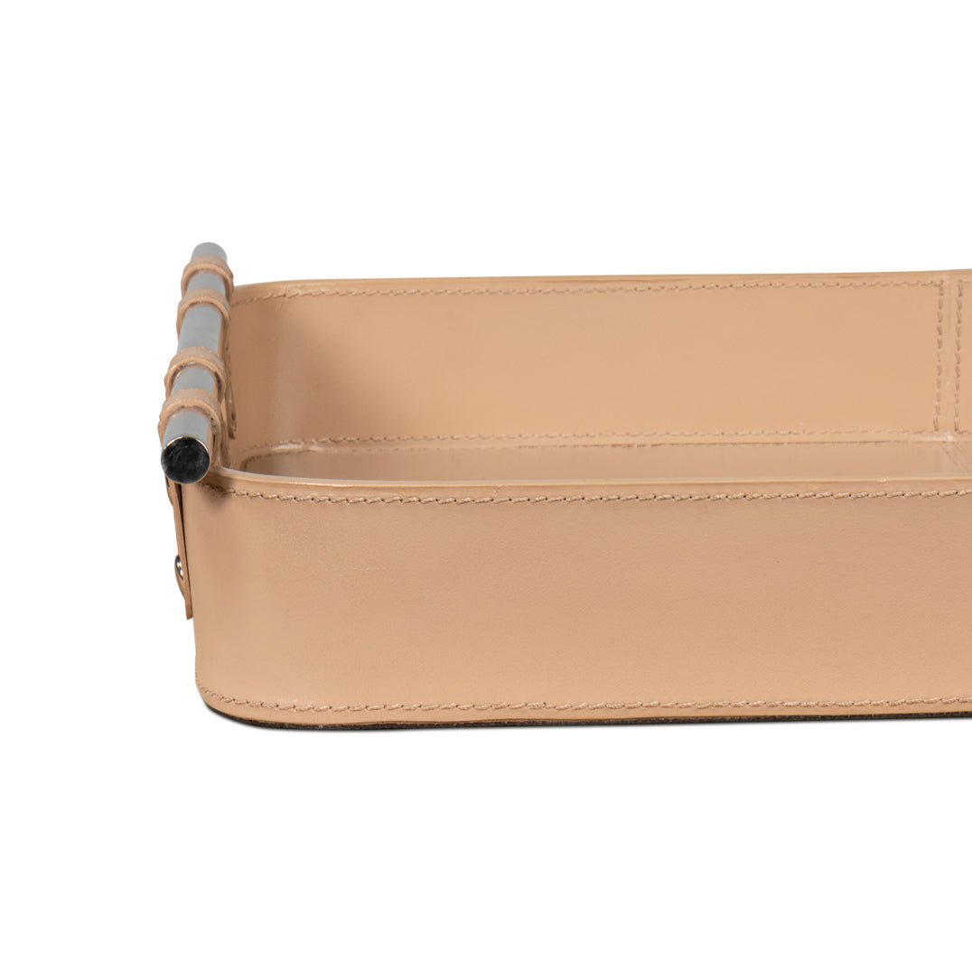 Tan leather tray, side view emphasizing material texture.