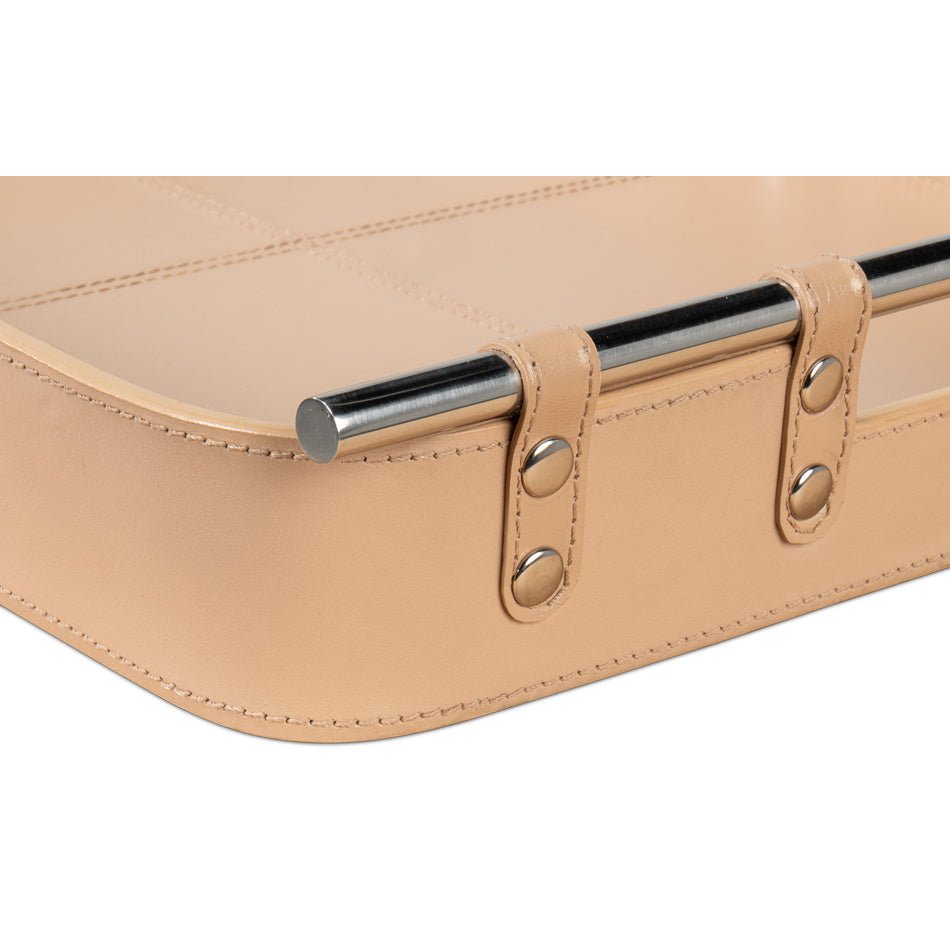 Tan leather tray, close-up of side stitching and handle.