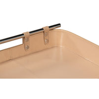 Tan leather tray, close-up of corner and snap detail.
