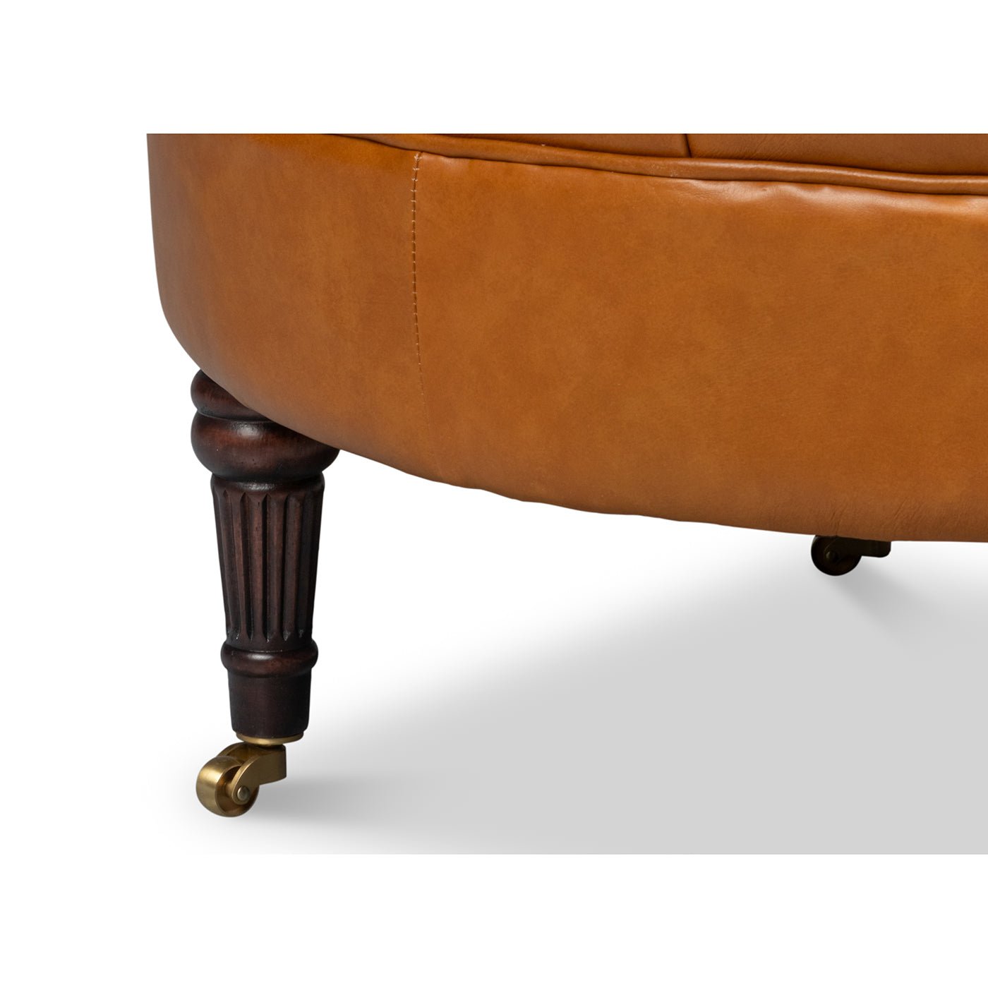 Chair front leg detail, wood with caster wheel.