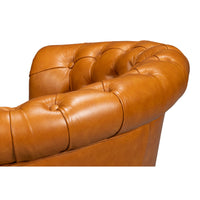 Close-up, chair backrest tufting detail.
