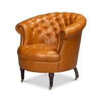 Tan leather barrel chair, front-right angle view.