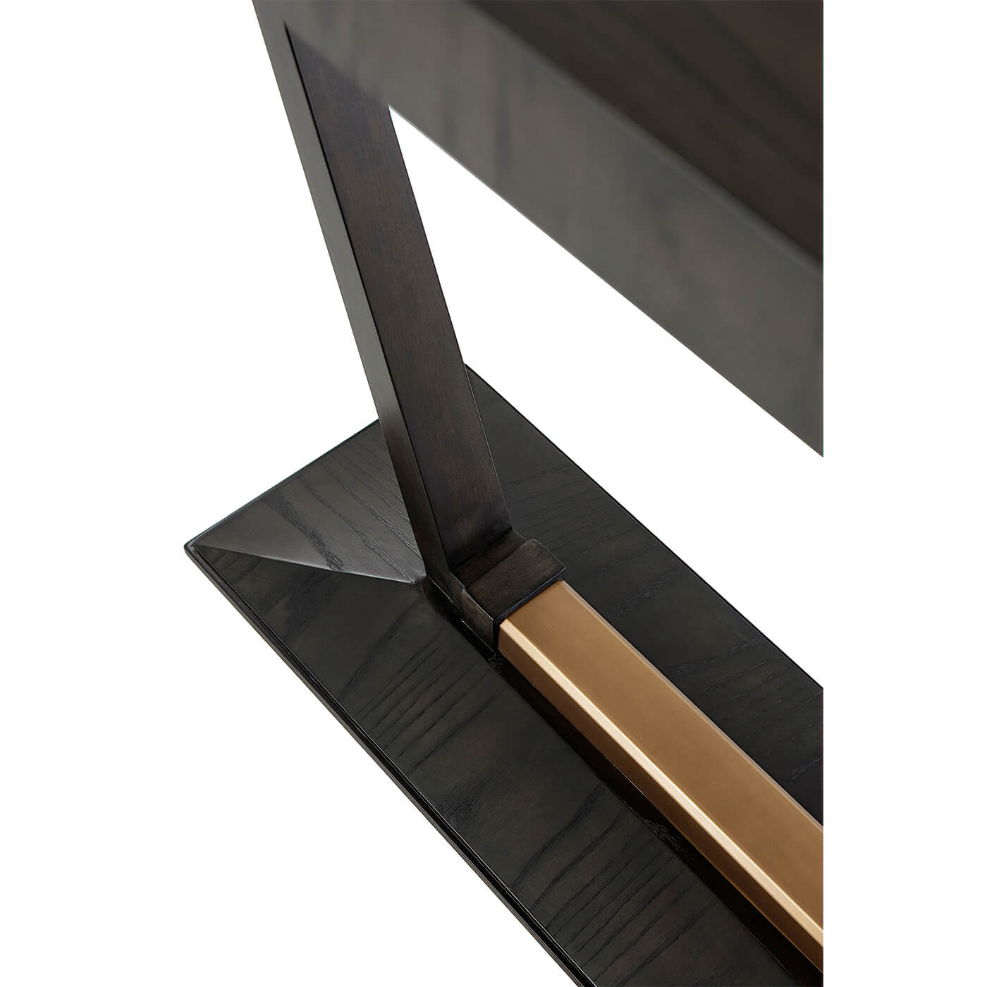 Angled detail of console table's gold and wood base.