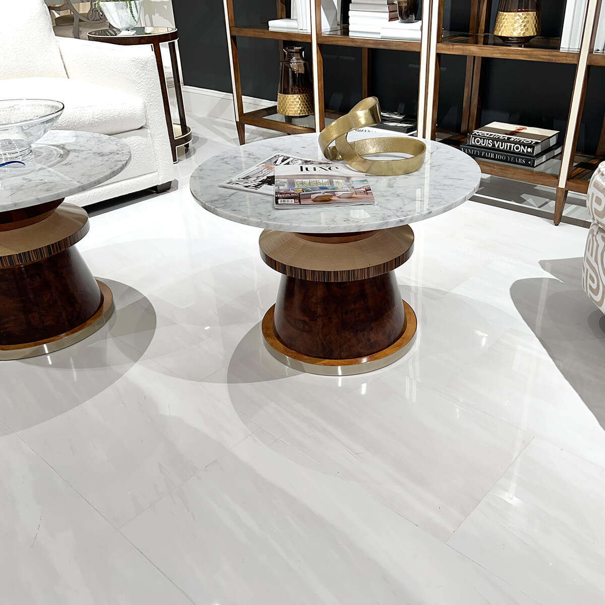 Two marble cocktail tables in modern living room.