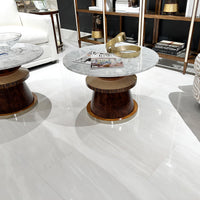 Two marble cocktail tables in modern living room.