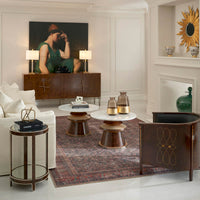 Stylish living room setup with eclectic cocktail tables.