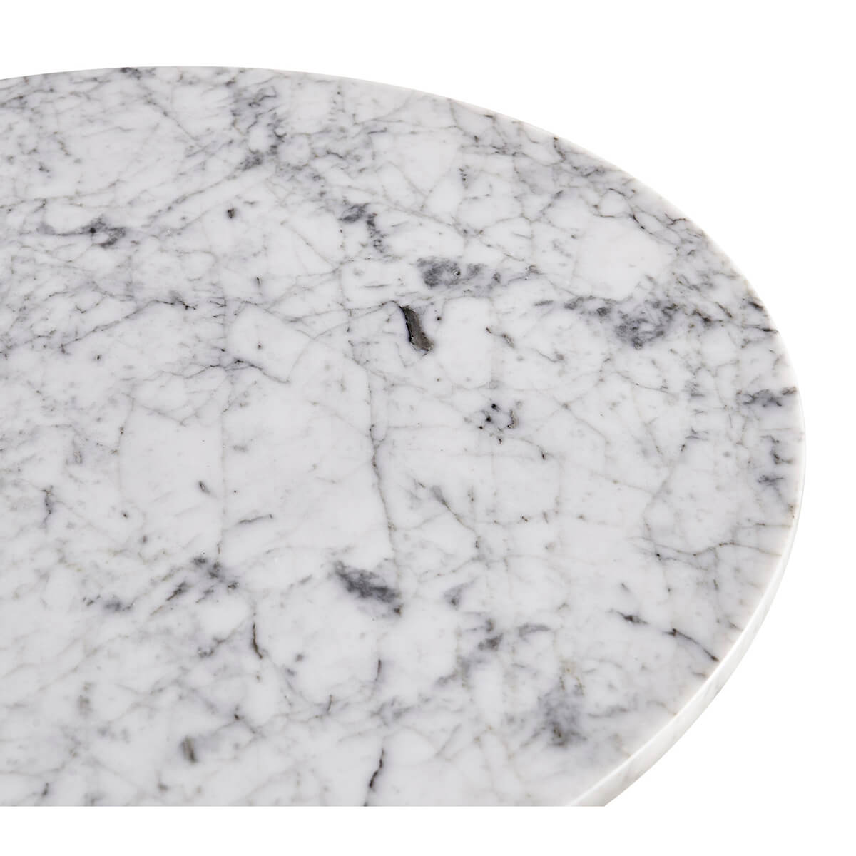 Marble tabletop detail on round cocktail table.
