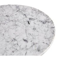 Marble tabletop detail on round cocktail table.