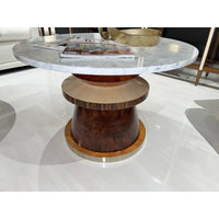 Close-up of marble cocktail table with decorative books.
