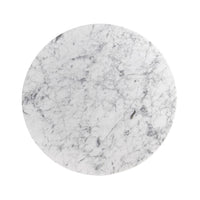 Overhead view of marble tabletop on eclectic cocktail table.