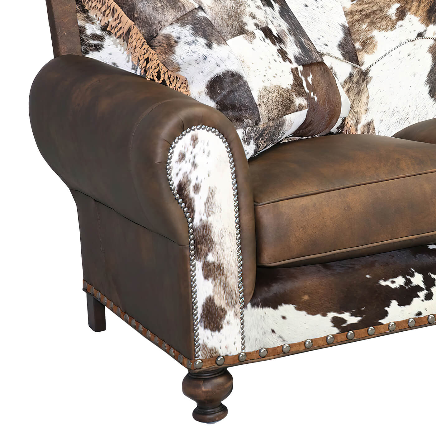 Close-up of sofa arm, brown leather, cowhide detail.
