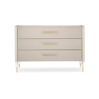 Front view of three-drawer modern dresser, sleek design.