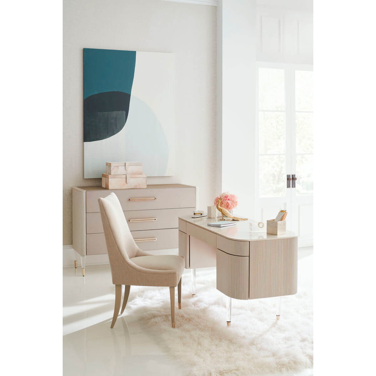 Room setup featuring three-drawer dresser and matching desk.