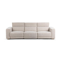 Straight-on front view of gray three-piece sofa with raised headrests and broad seat cushions