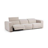 Gray power reclining sofa with one footrest extended, one headrest raised and two headrests lowered