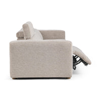 Side view of gray sofa with the footrest extended to reveal the reclining mechanism