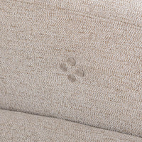 Close-up of the discreet reclining control buttons on the gray sofa inner side