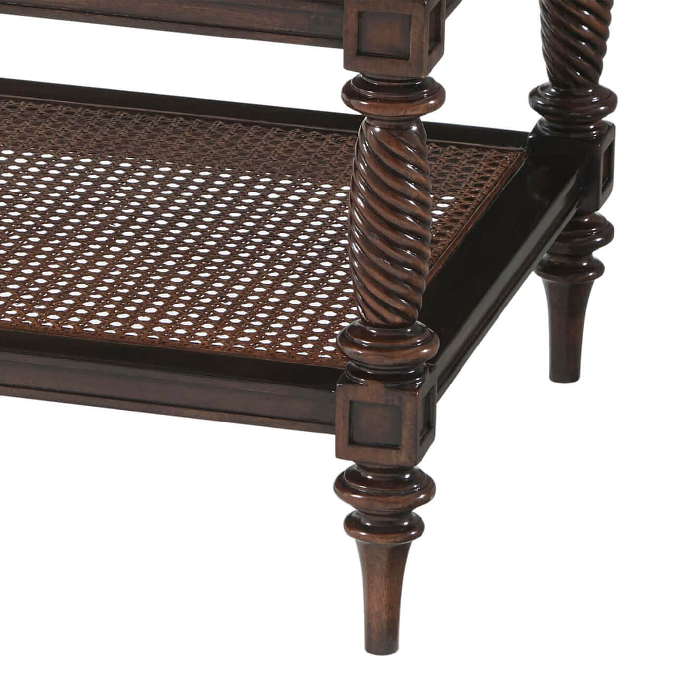 Close-up of nightstand's intricate carved wooden legs.