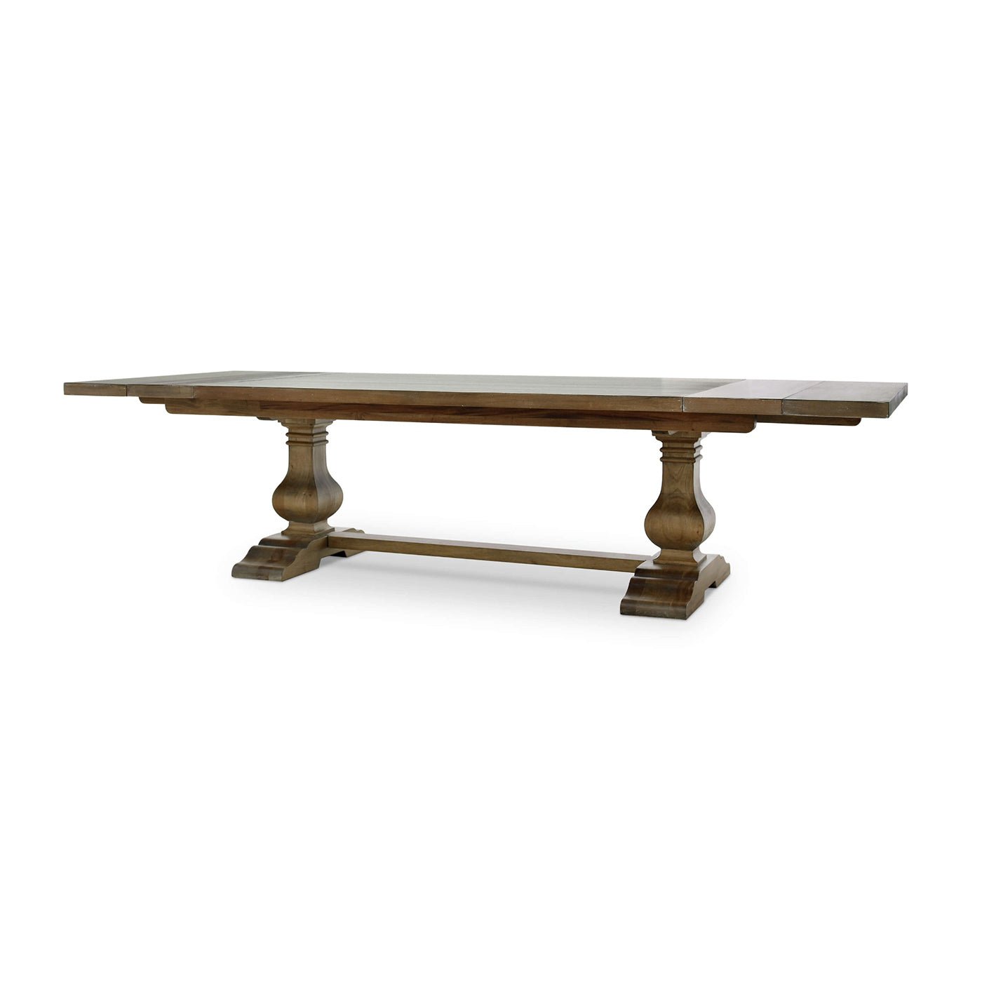 Extendable trestle dining table, angled side view.