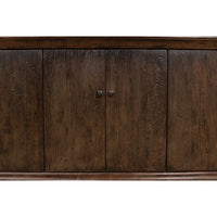 Close-up of closed wooden doors on sideboard.
