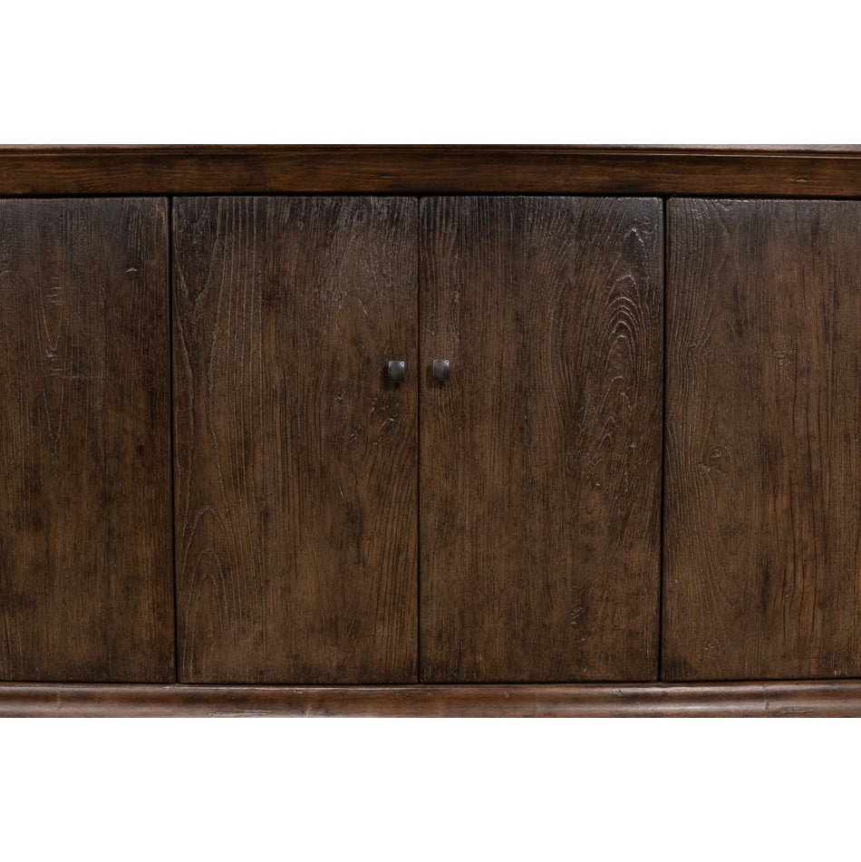 Close-up of closed wooden doors on sideboard.