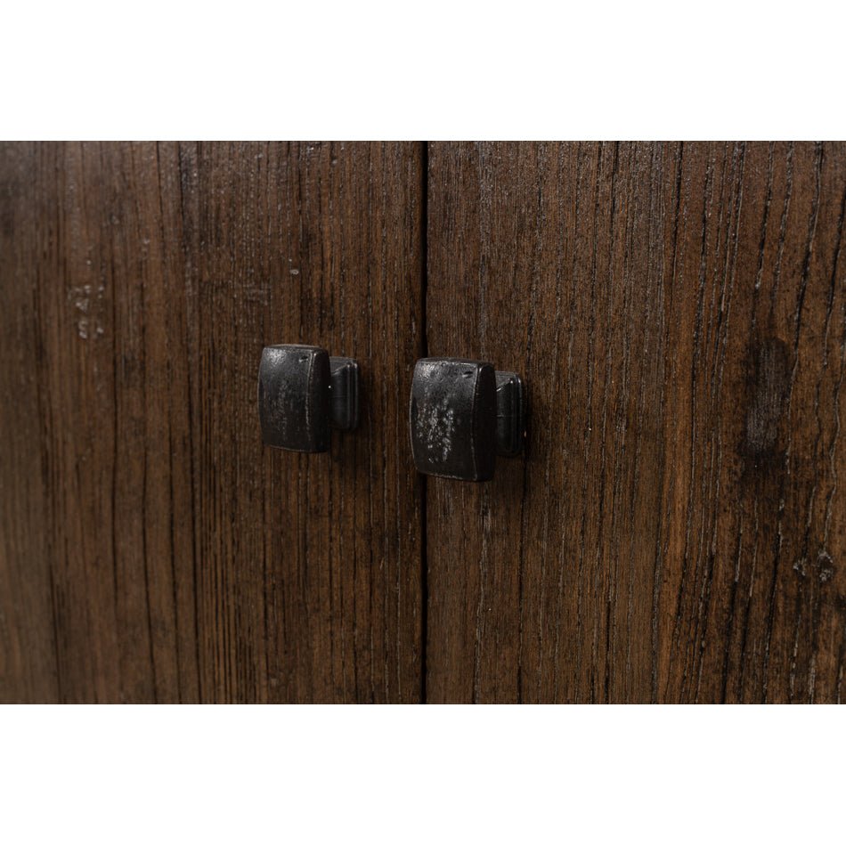 Detailed view of sideboard's rustic knobs.