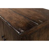 Close view of distressed wood finish on sideboard.