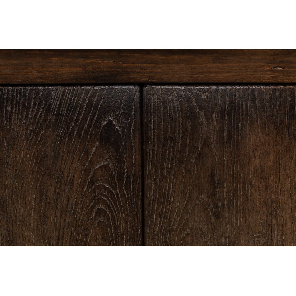 Detailed wood texture on sideboard's front doors.