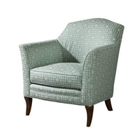 Geometric patterned armchair, front angle view, green fabric.