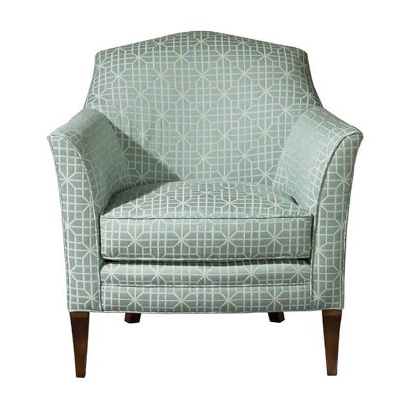 Geometric patterned armchair, front view, green fabric.