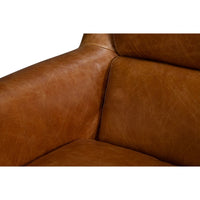 Arm and cushion detail of leather swivel chair