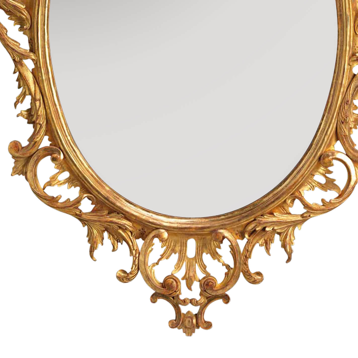 Bottom detail of traditional Chippendale oval mirror design.
