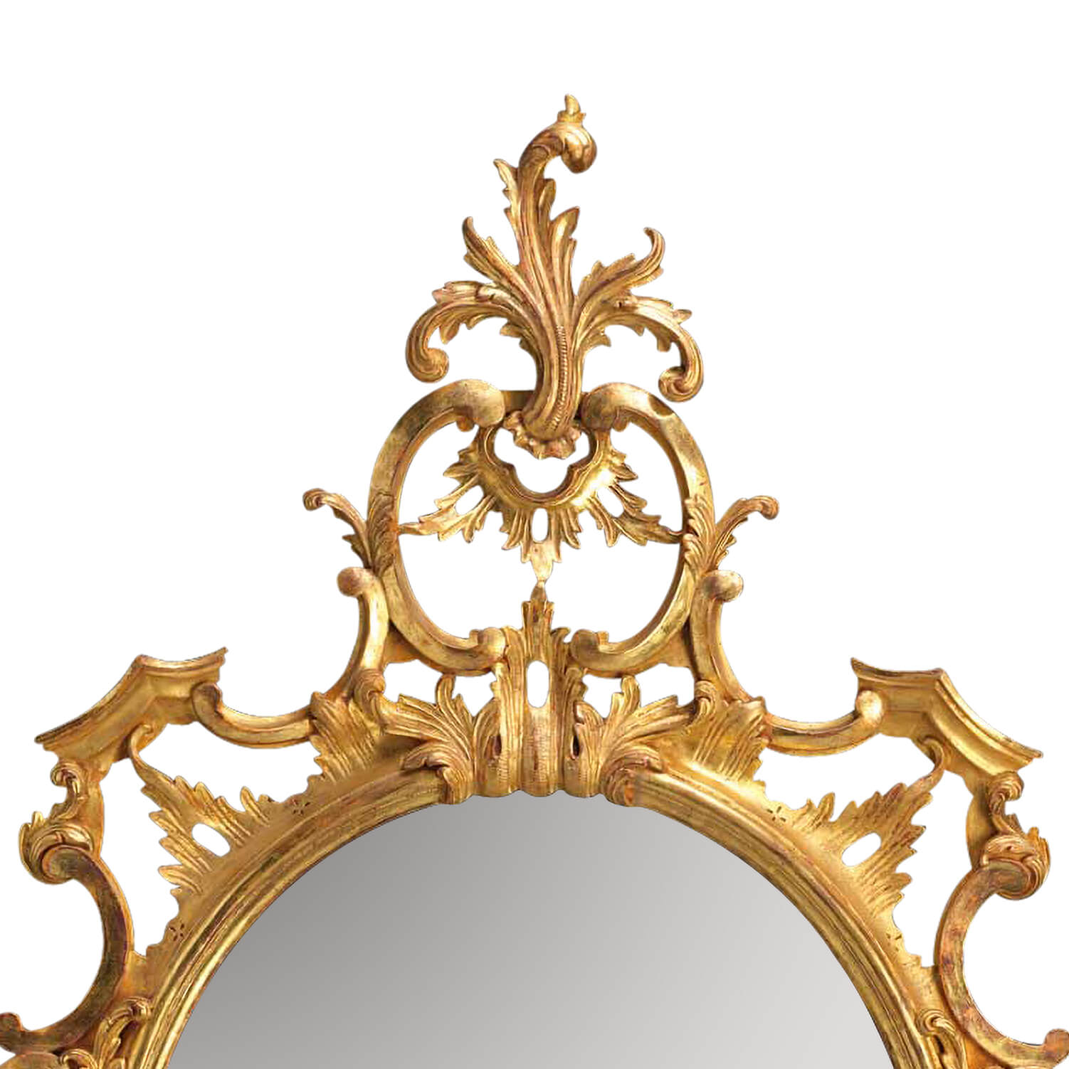 Top detailing of traditional Chippendale oval mirror frame.