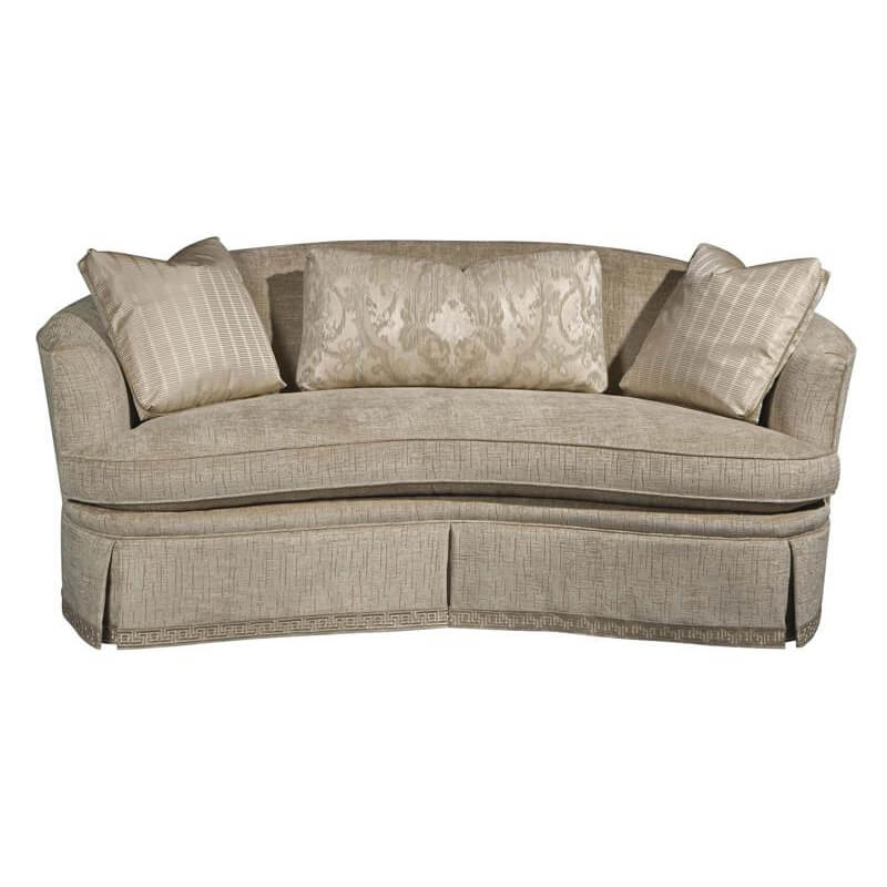 Traditional curved back sofa, front view with cushions.