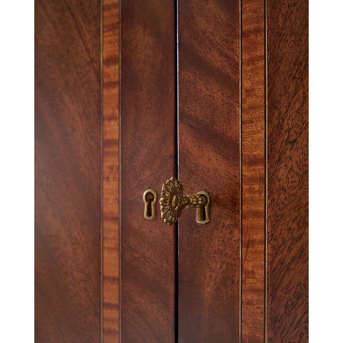Traditional English sideboard, keyhole detail close-up.