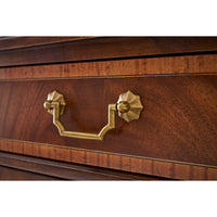 Traditional English sideboard, brass handle close-up.