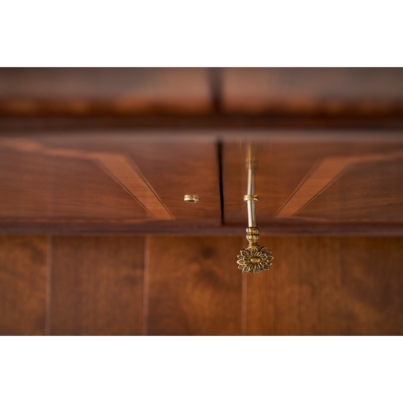 Detailed view of sideboard lock mechanism.