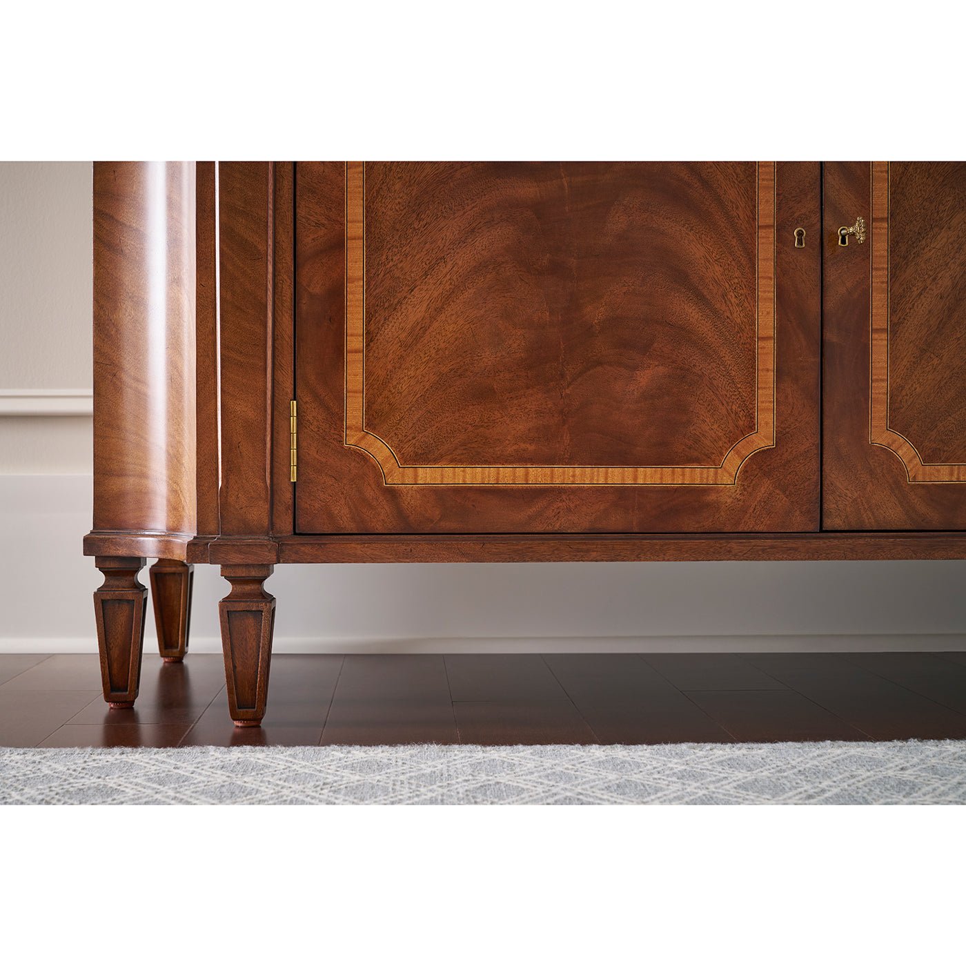Close-up of sideboard legs and bottom detail.