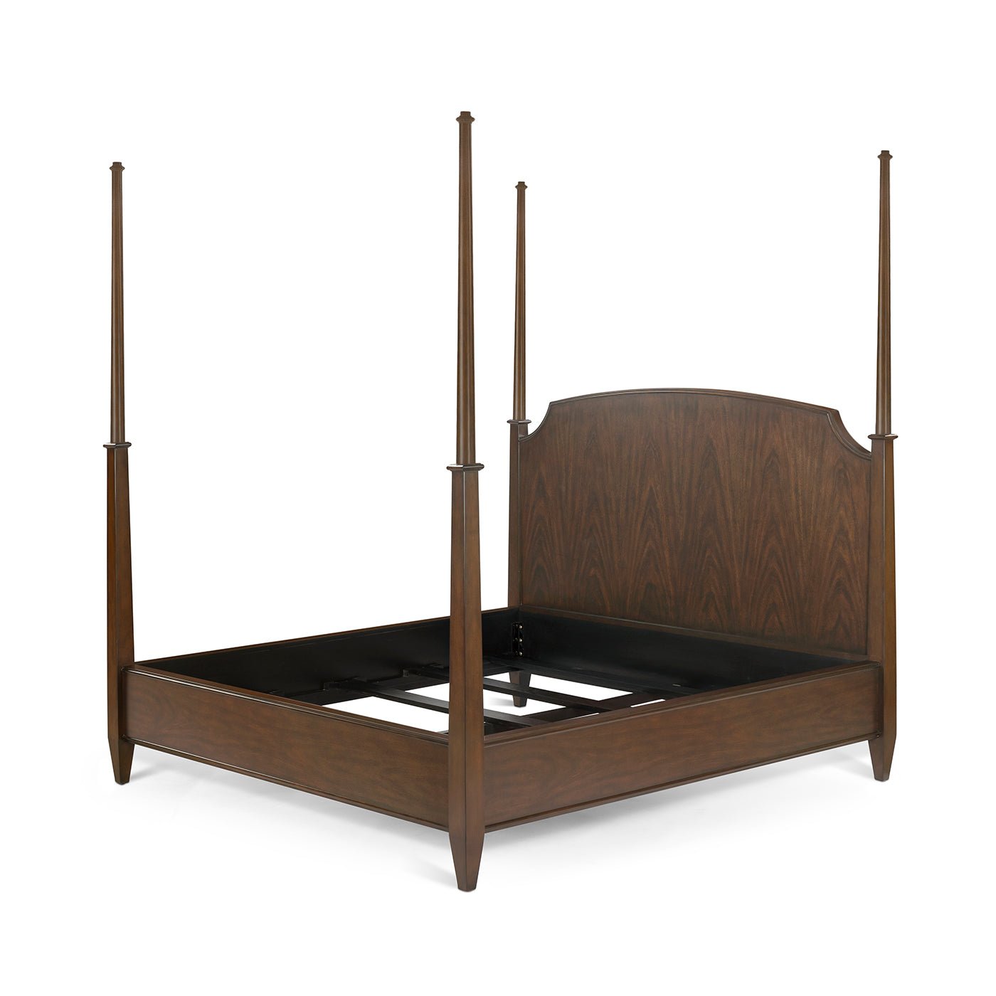 Traditional king poster bed frame without bedding, empty view.
