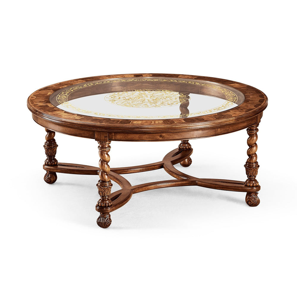 Round coffee table with glass inset, angled view.