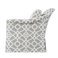 Upholstered armchair, side profile, unique pattern, comfortable armrest.