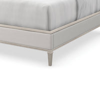 Detail of silver bed frame and leg, transitional design.
