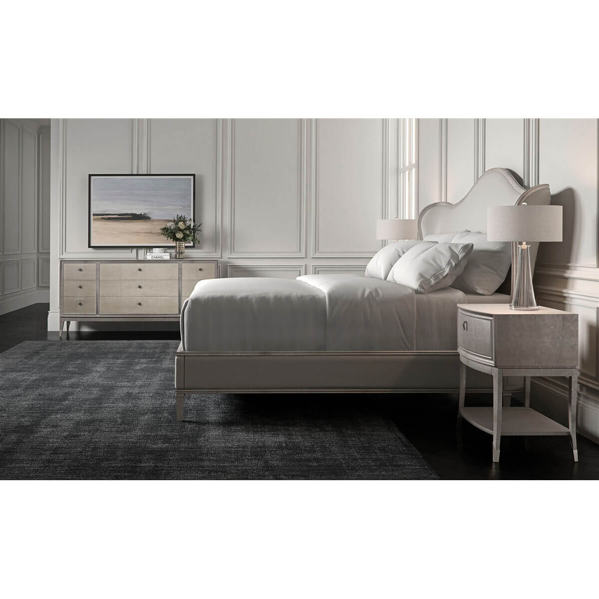 Bedroom with silver bed, dresser, and nightstand, elegant decor.