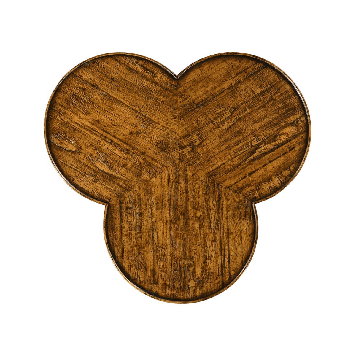 Top view of trefoil wood side table surface detail.