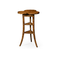 Wooden trefoil side table with three tiers, angled view.
