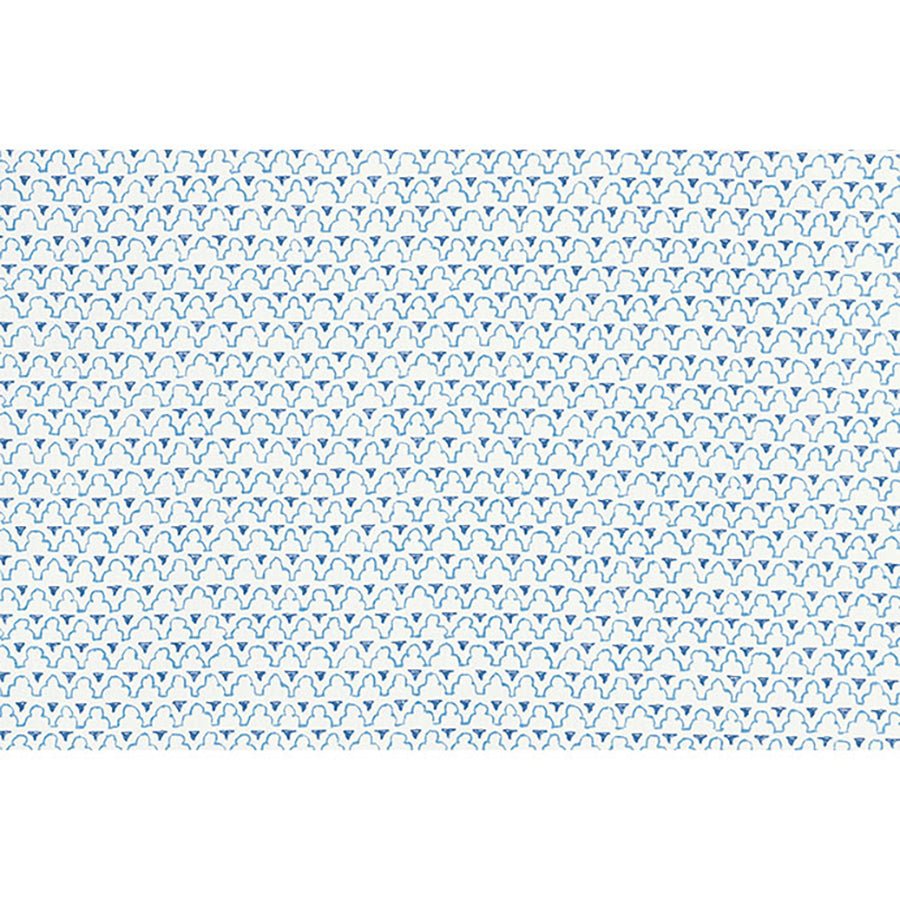 Close-up of trellis pattern fabric on storage ottoman.