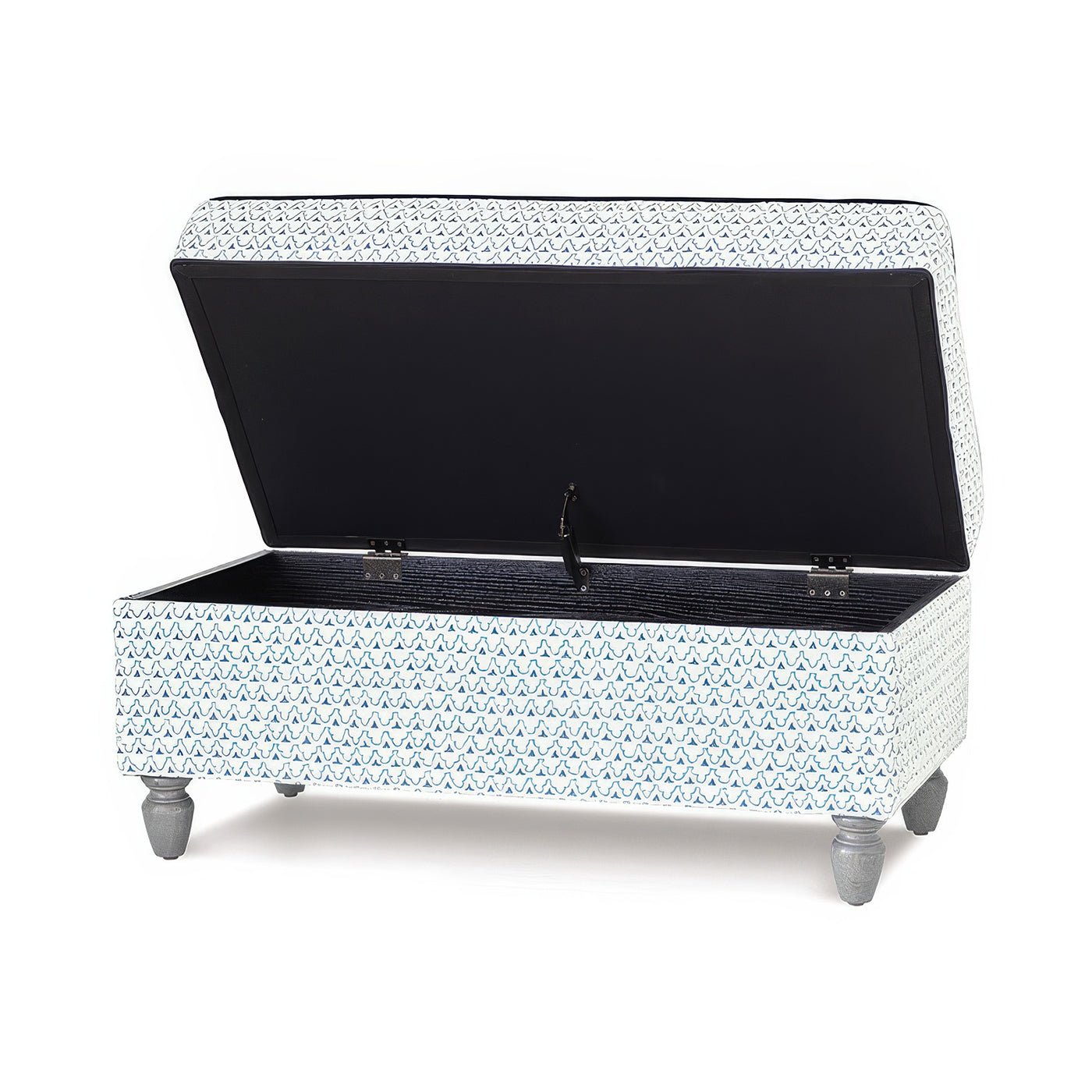 Open trellis print storage ottoman showing interior space.
